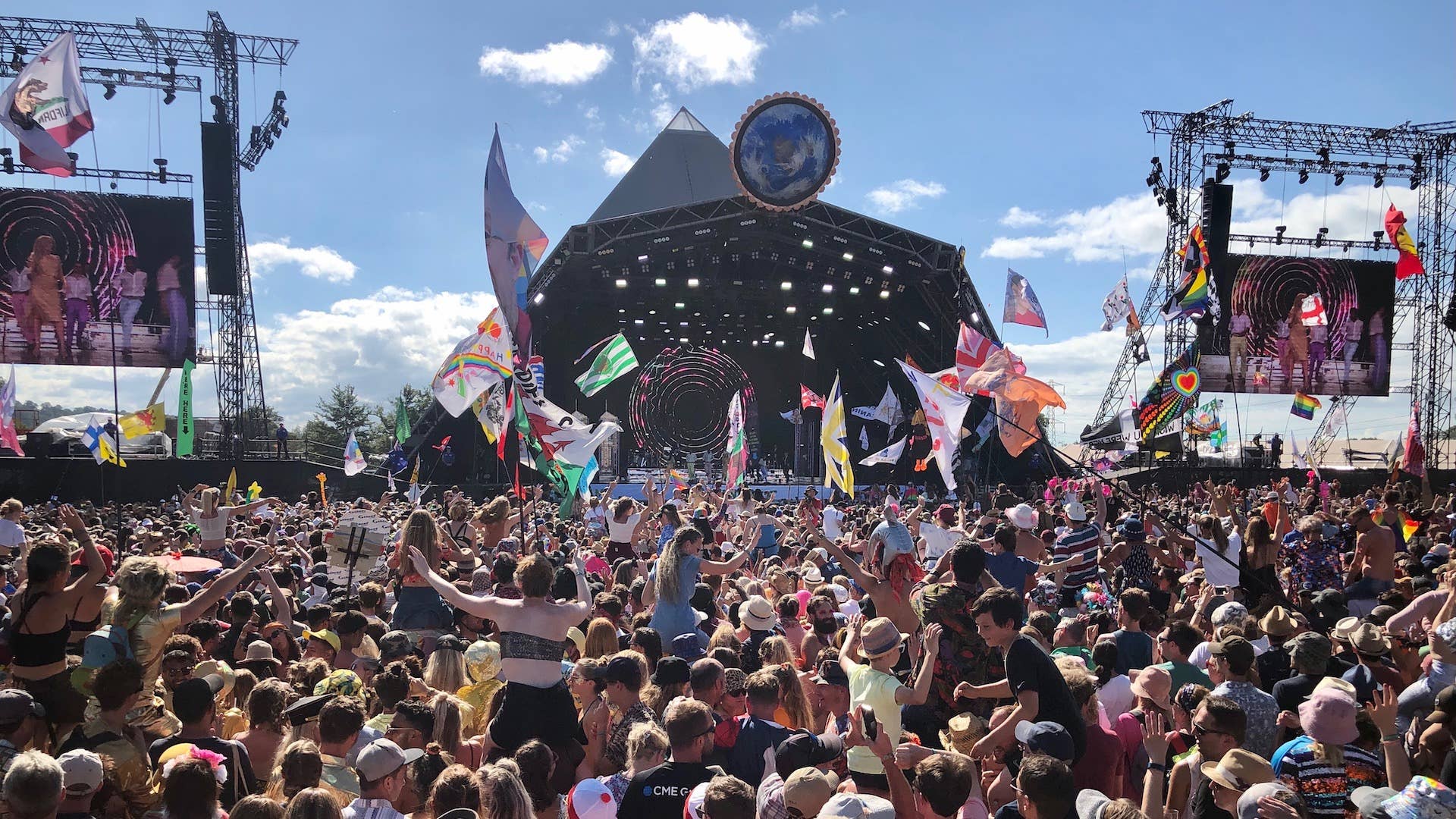 Crowds listen to Kylie perform on the Pyramid Stage at the 2019 Glastonbury Festival