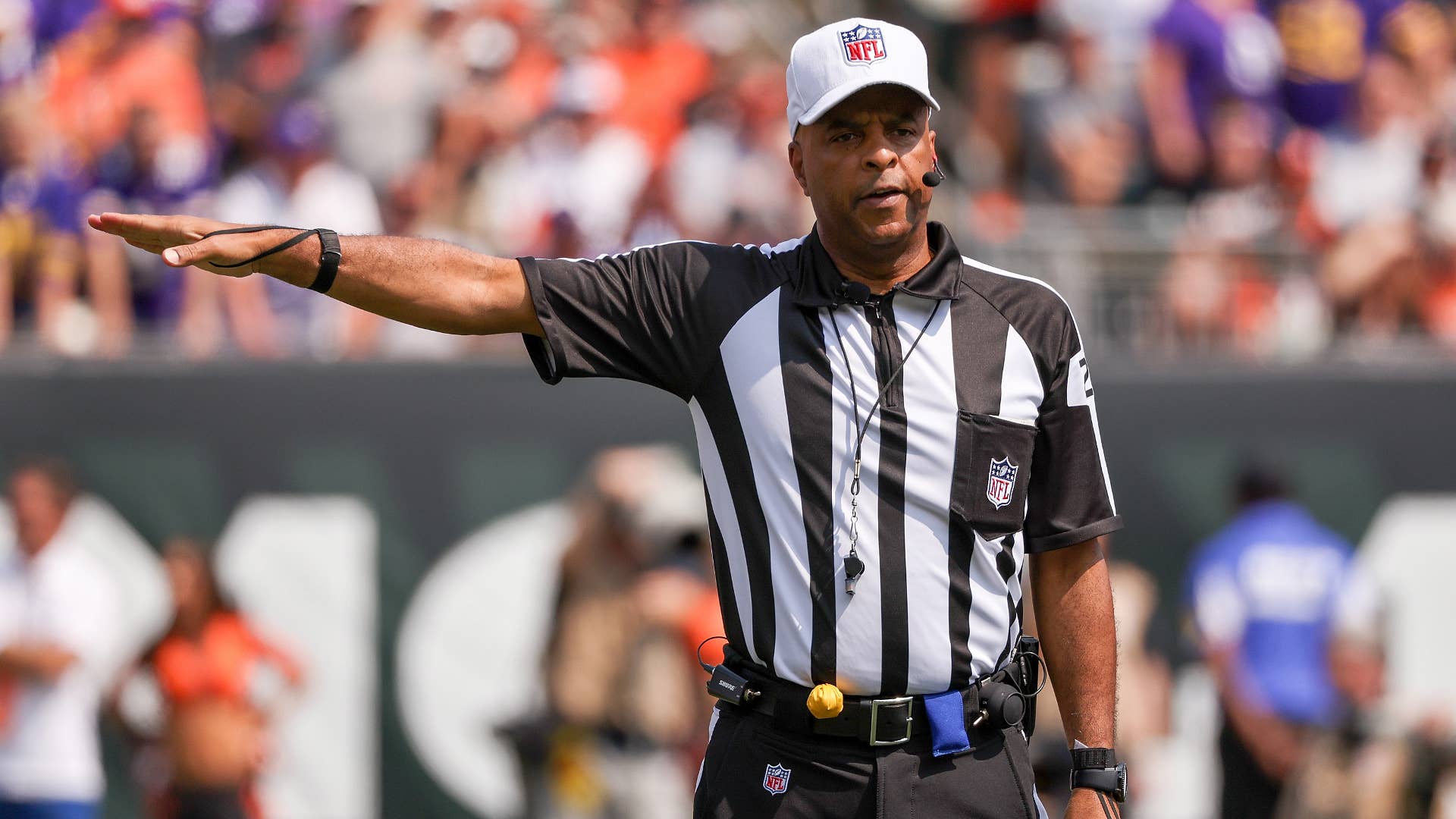 Referee Adrian Hill announces a penalty in the first quarter during the game between the Minnesota Vikings and Cincinnati Bengals.