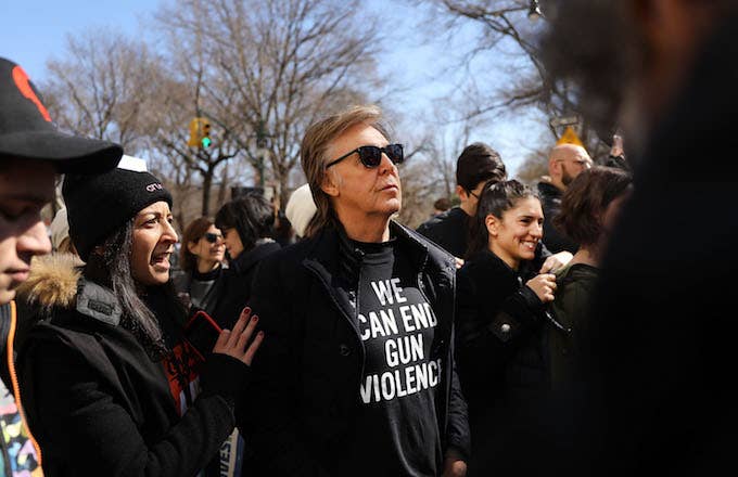 Sir Paul McCartney joins thousands of people, many of them students, march against gun violence.