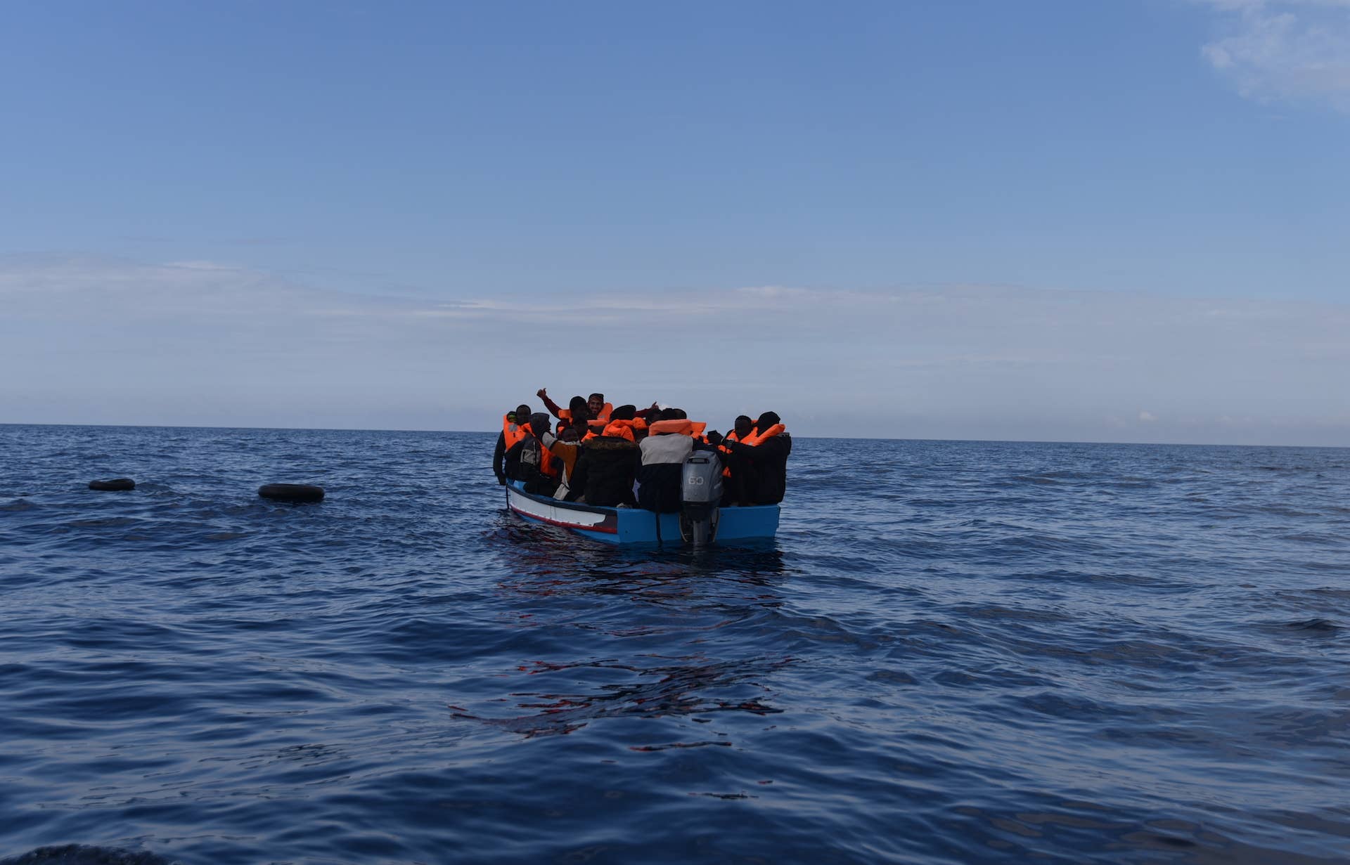 A small wooden boat carrying about 35 migrants capsized off the Libyan coast