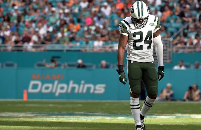 Darrelle Revis looks at the ground for answers.