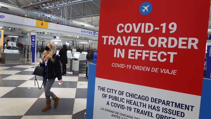 Chicago&#x27;s O&#x27;Hare International Airport, COVID-19 travel order in effect sign.
