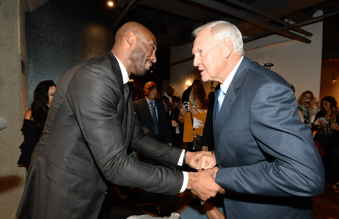 Jerry West and Kobe Bryant greet before a game between the Warriors and Lakers.