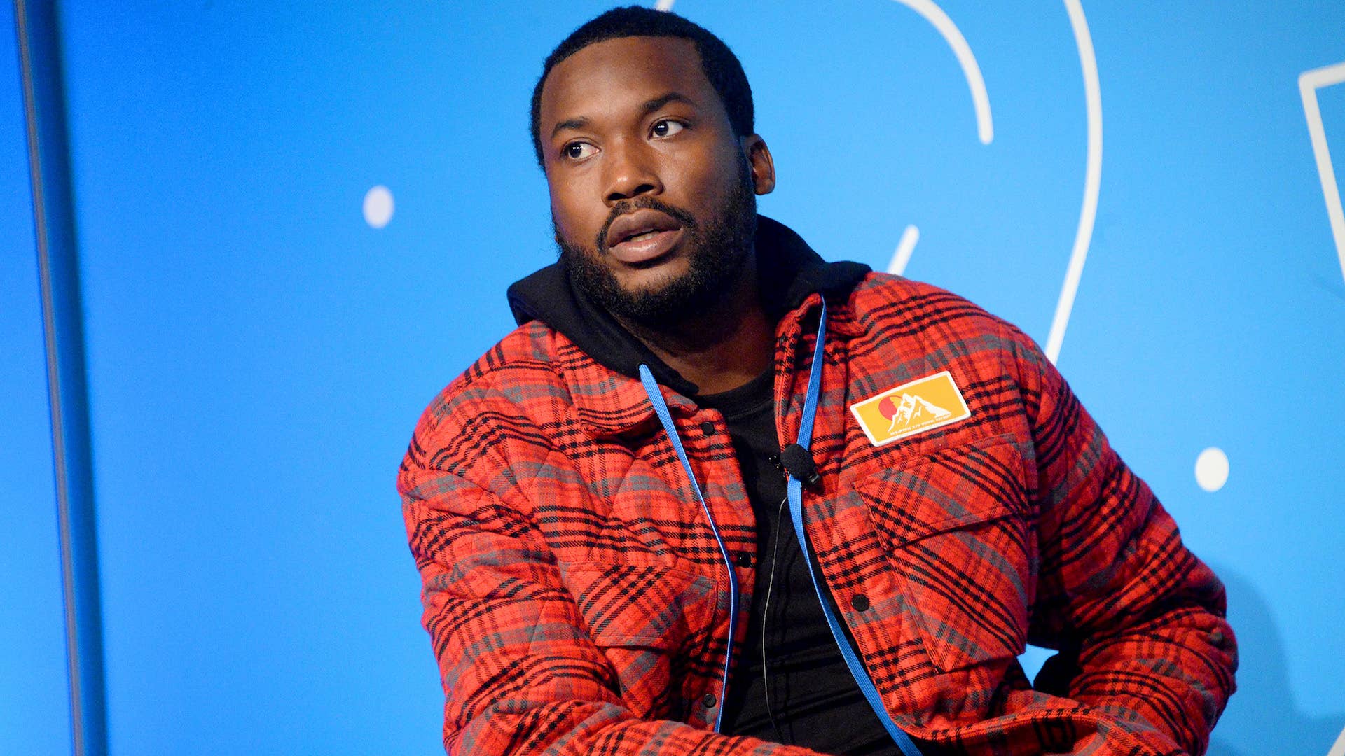 Meek Mill speaks on stage at the "Justice for All: Reforming a Broken System."