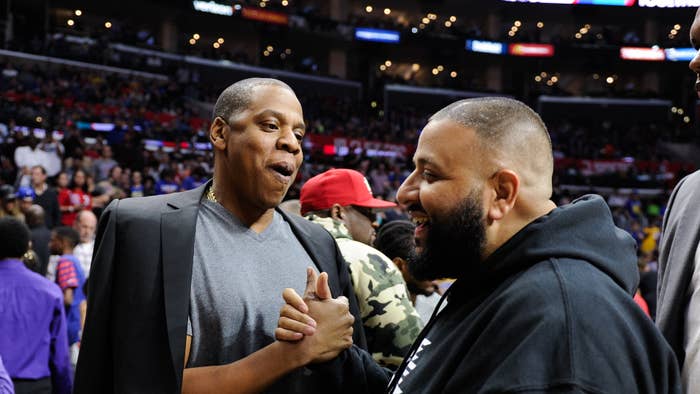 Jay and DJ Khaled attend a basketball game in 2016.
