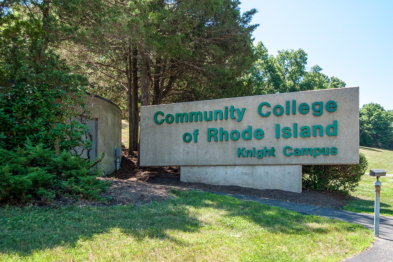 A college campus entrance is shown