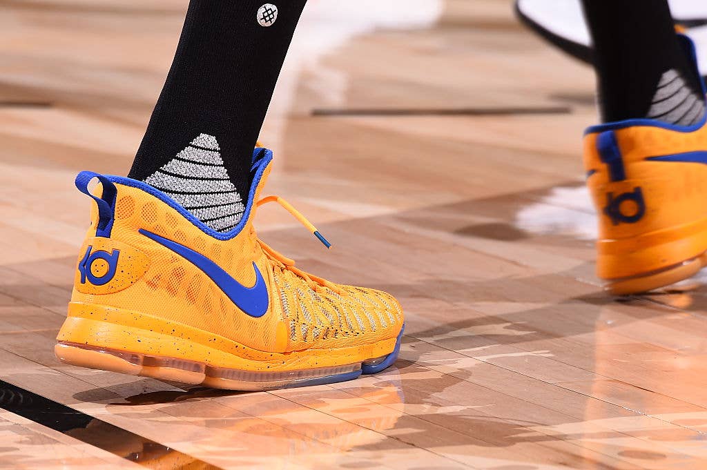 Kevin Durant wearing Yellow/Blue Nike KD 9 PE Shoes