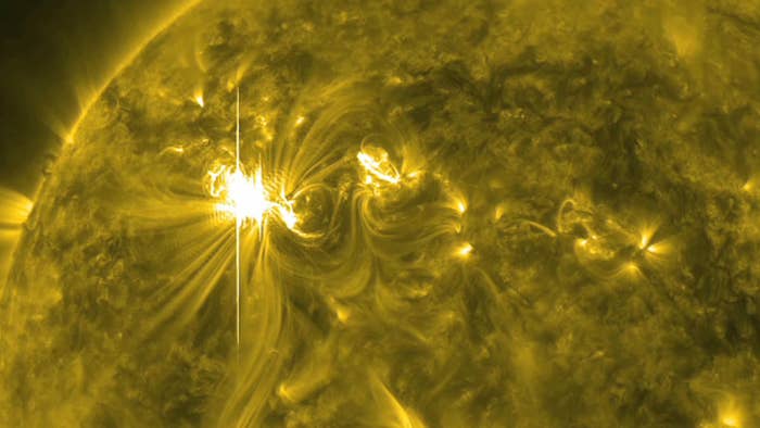 a X5.4 solar flare, the largest in five years, erupts from the sun&#x27;s surface.