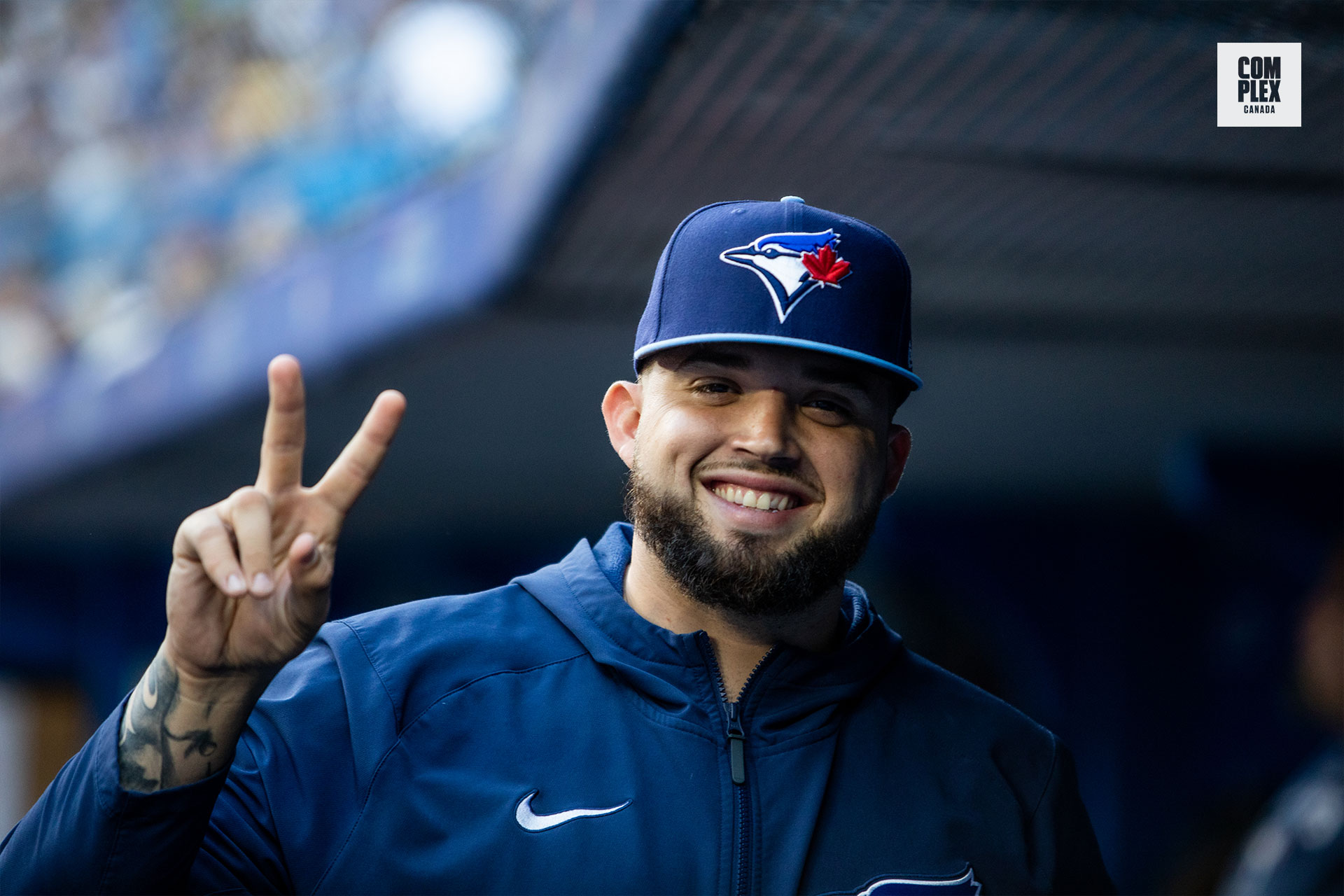 Toronto Blue Jays&#x27; Alek Manoah flashes peace sign at game