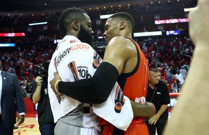 James Harden and Russell Westbrook embrace after a game.