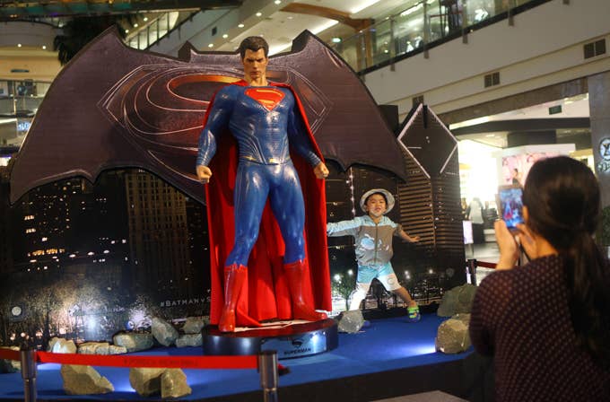 Fans visit the 'Batman v Superman: Dawn of Justice' exhibition area