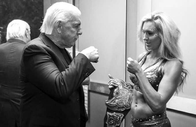 Charlotte Flair shares a photo of her and father Ric on Instagram.
