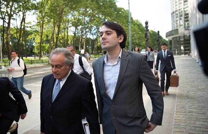 Ex pharmaceutical executive Martin Shkreli leaves with his lawyer Benjamin Brafman