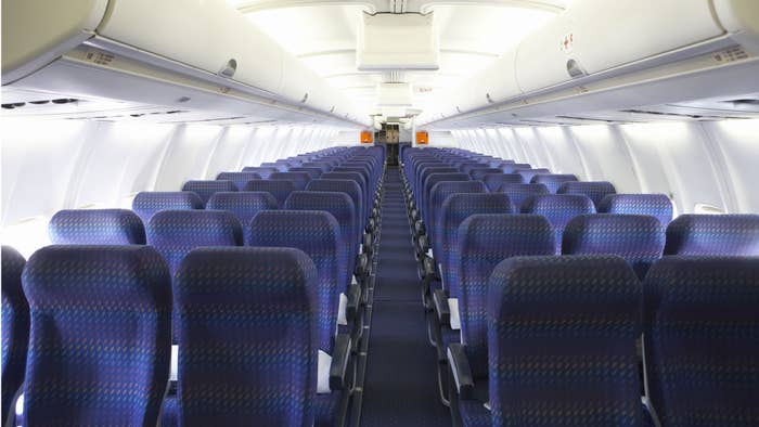 Rows of airplane seats.