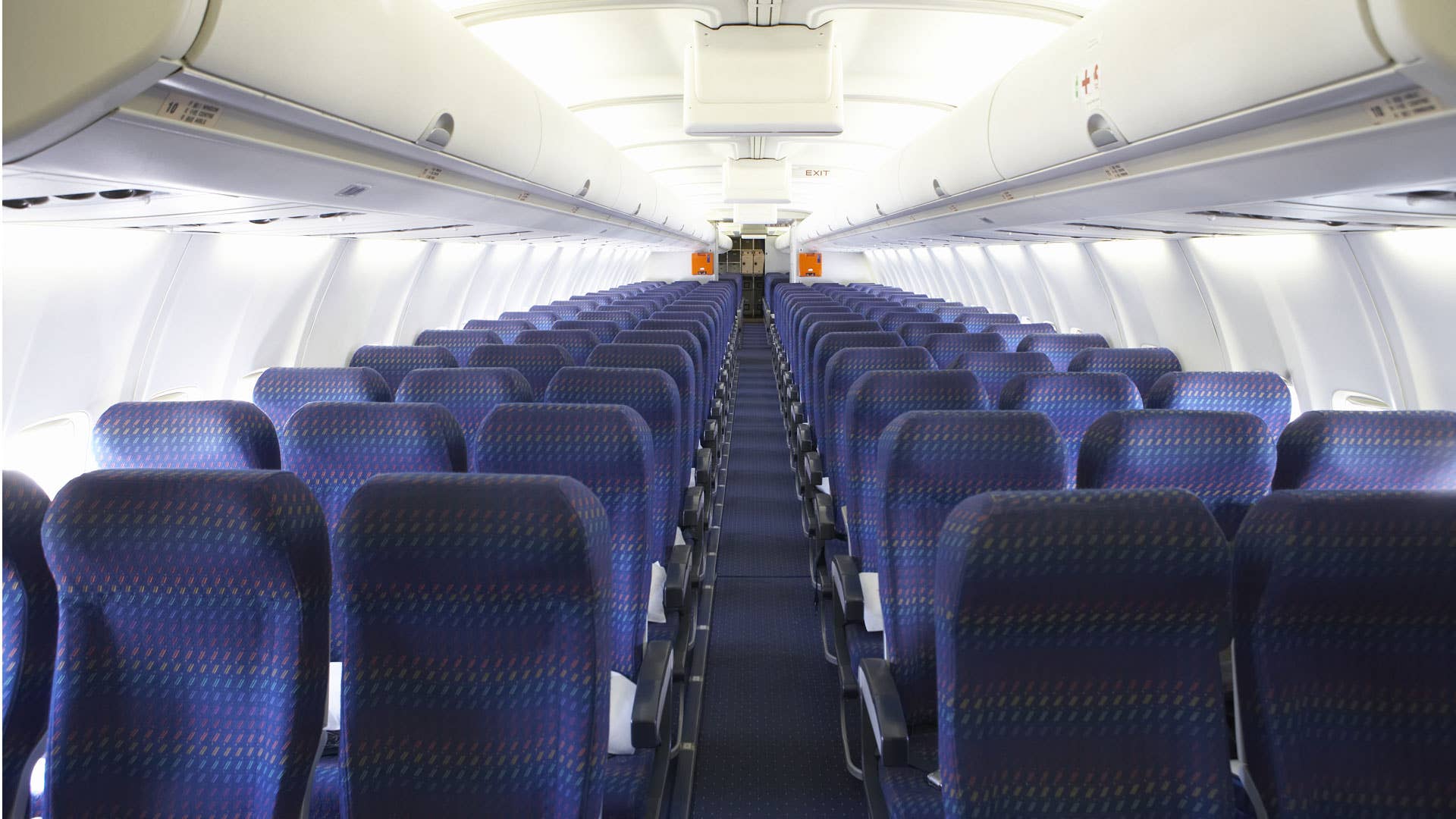 Rows of airplane seats.