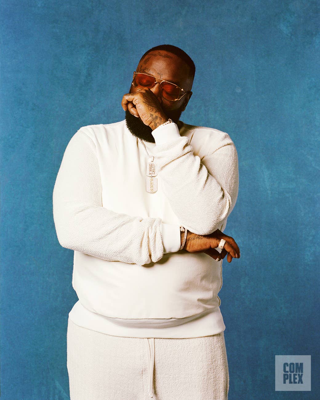 Rick Ross poses for his Complex interview