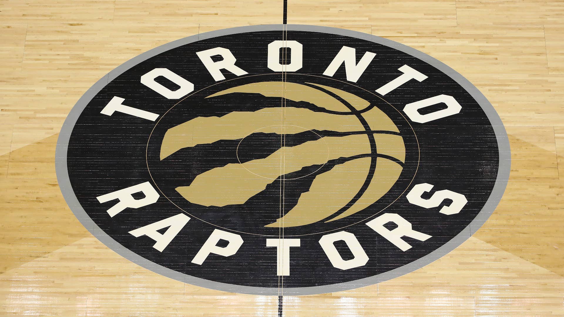 The team logo decal at center court on Welcome Toronto night during the Toronto Raptors NBA game.
