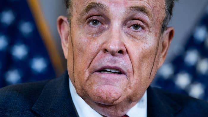 Rudy Giuliani is pictured sweating profusely