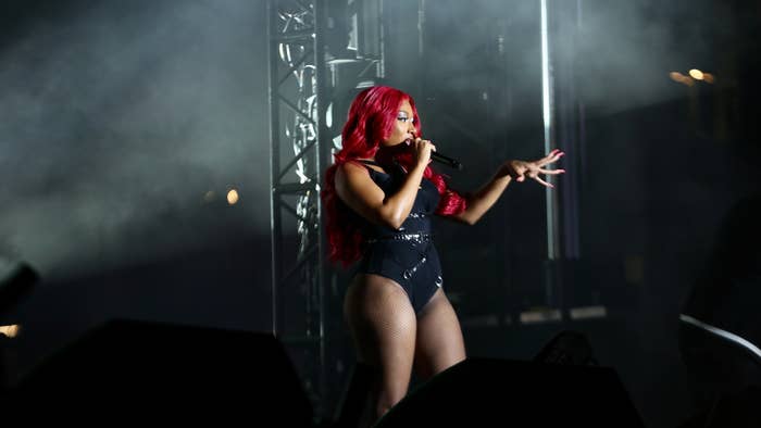 Megan Thee Stallion is pictured performing live