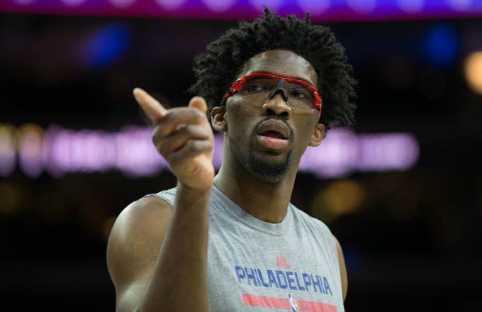 Joel Embiid warms up before a 76ers game.