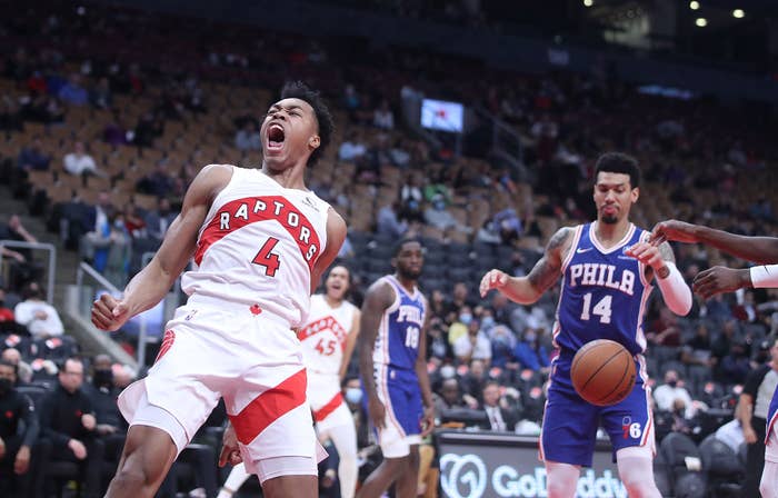 Toronto Raptors forward Scottie Barnes (4) celebrates a dunk as the Toronto Raptors play the Philadelphia 76ers in preseason action in Toronto. October 4, 2021.