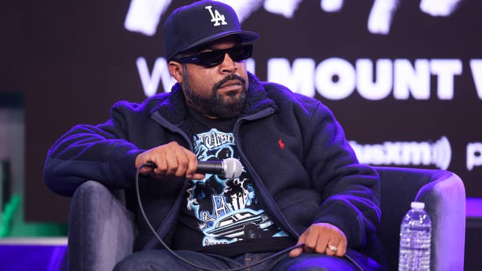 Ice Cube is seen holding a mic