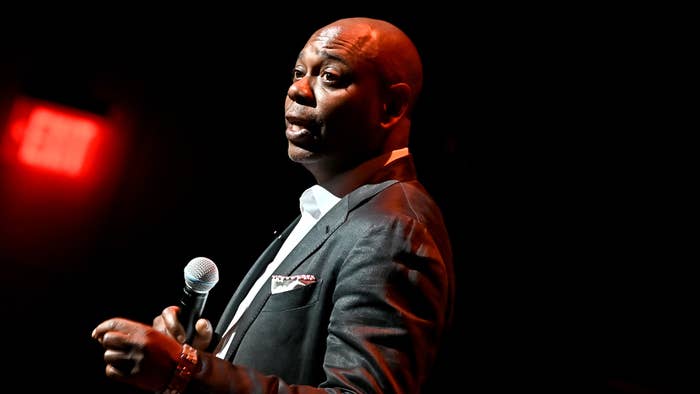 Dave Chappelle performs onstage during the Dave Chappelle theatre dedication ceremony