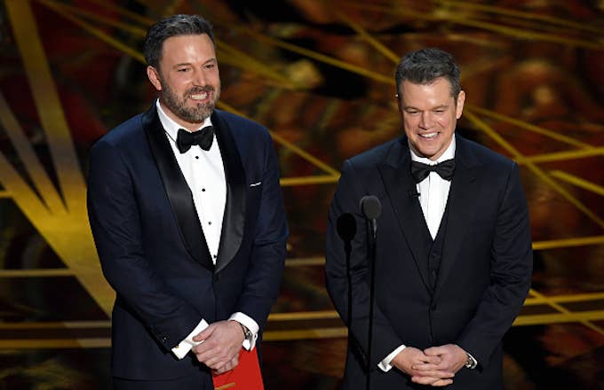 Ben Affleck (L) and Matt Damon speak onstage during the 89th Annual Academy Awards