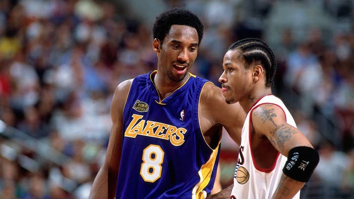 Kobe Bryant #8 of the Los Angeles Lakers chats with Allen Iverson