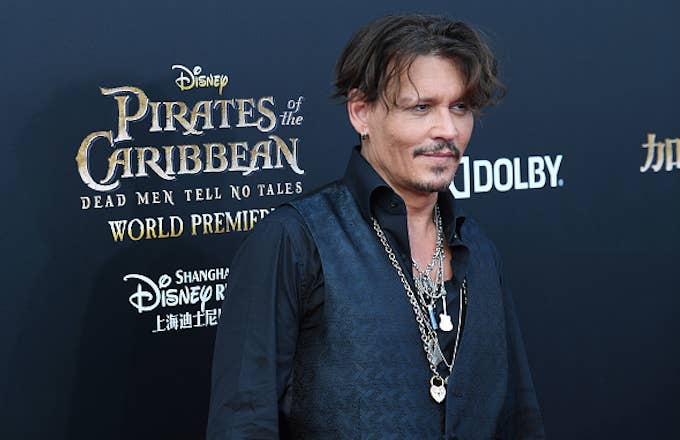 Johnny Depp attends the premiere of film &#x27;Pirates of the Caribbean: Dead Men Tell No Tales&#x27;