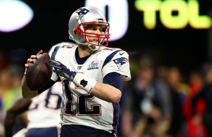 Tom Brady #12 of the New England Patriots makes a pass against the Los Angeles Rams