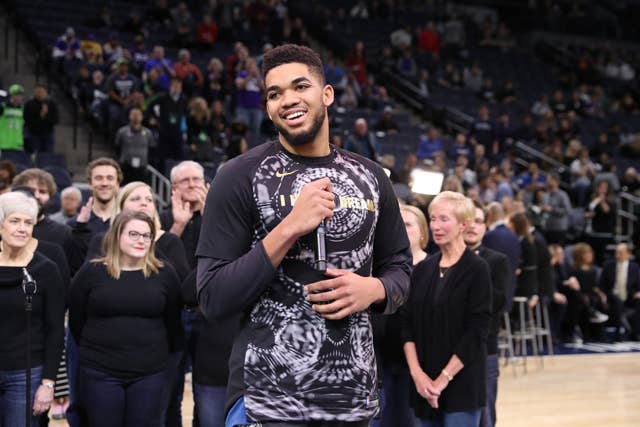 Karl Anthony Towns of the Minnesota Timberwolves speaks to the crowd