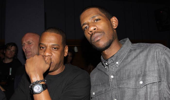 Young Guru and Jay Z attend the 40/40 Club in 2010