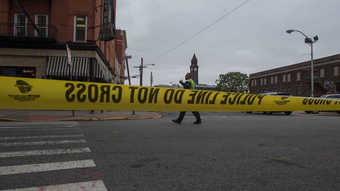 Photograph of police tape at crime scene