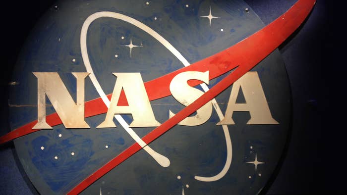 NASA logo hangs on a wall