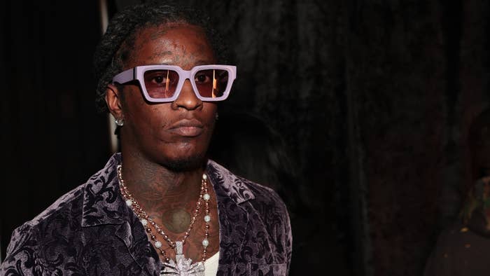 Young Thug is seen wearing sunglasses