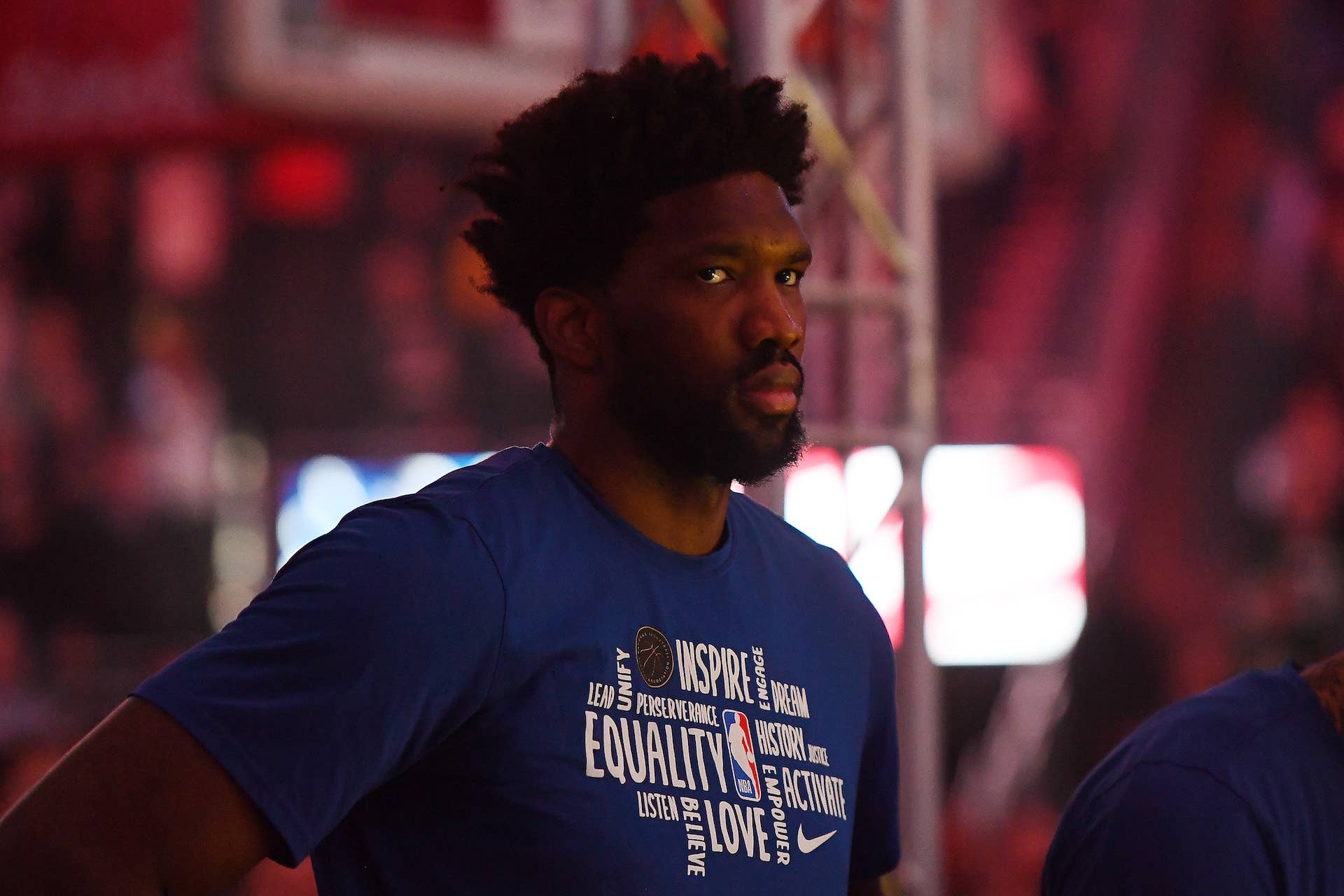 Joel Embiid #21 of the Philadelphia 76ers stands for the National Anthem prior to a game.