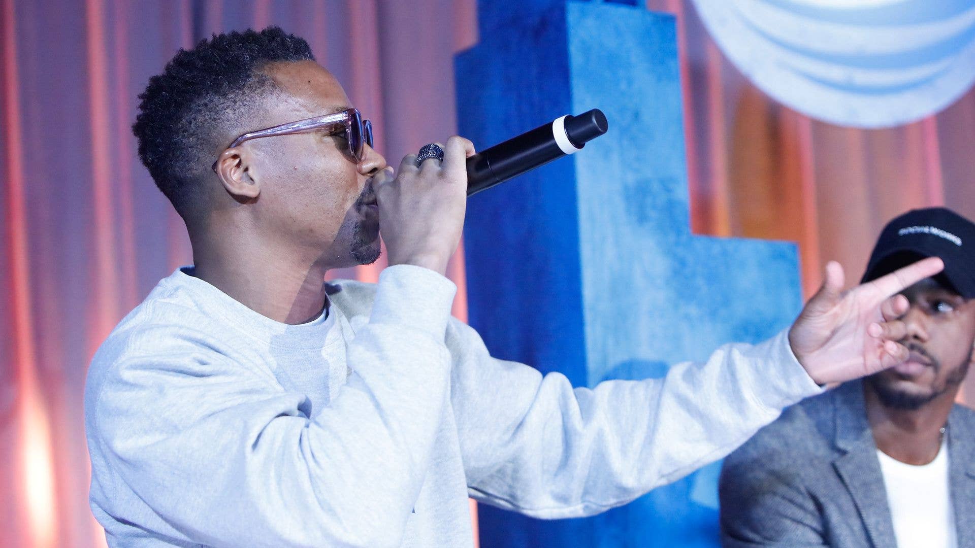 Lupe Fiasco photographed on stage