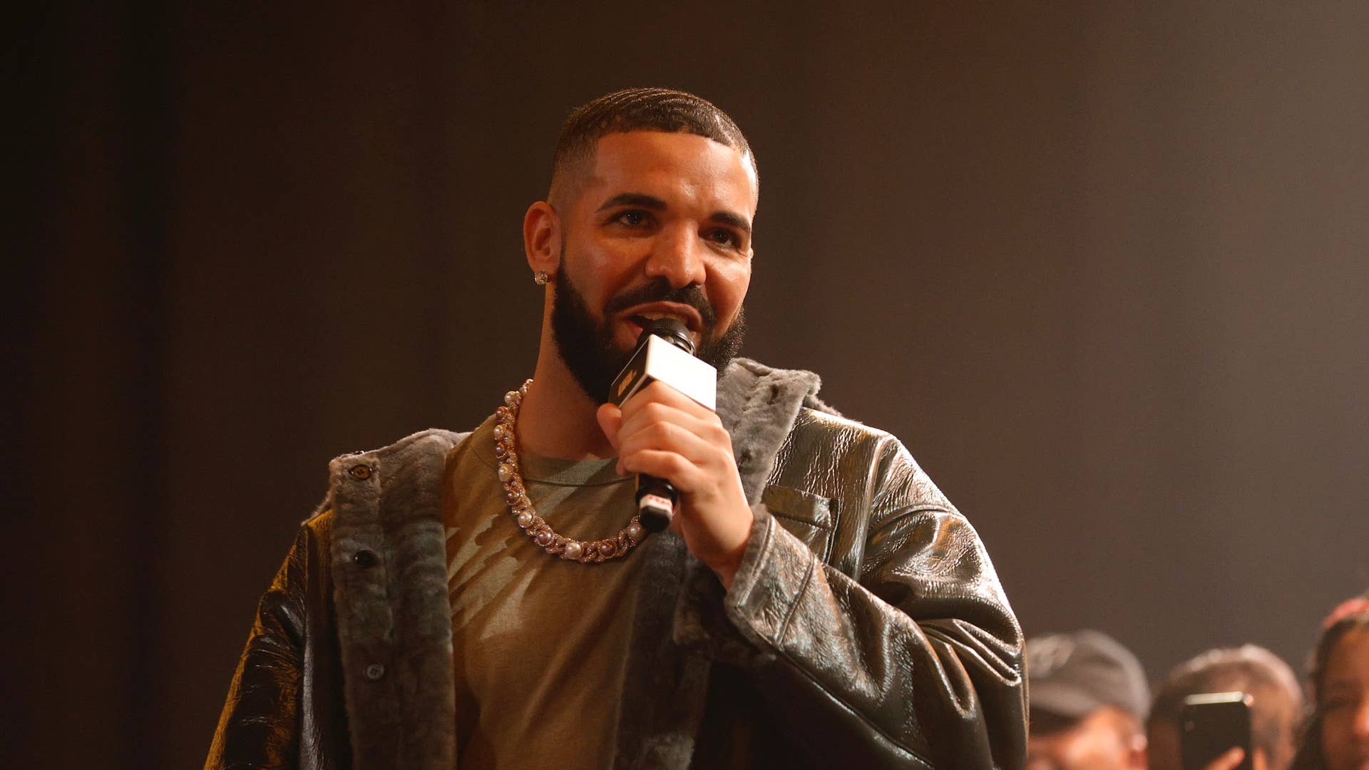 Drake speaks onstage during Drake's Till Death Do Us Part rap battle
