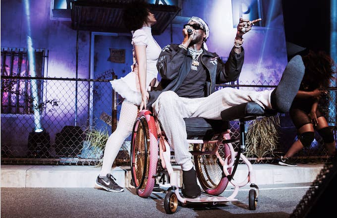 2 Chainz performing in a wheelchair