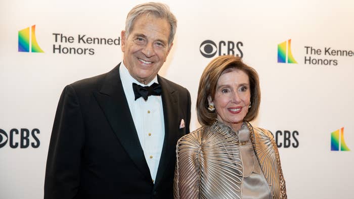 Nancy Pelosi is pictured alongside her husband