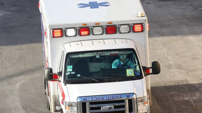 An ambulance carries a patient from the Zaandam cruise ship arrived at Port Everglades.