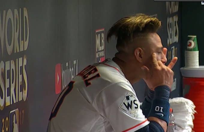 Yuli Gurriel makes racist gesture directed at Yu Darvish while in dugout.