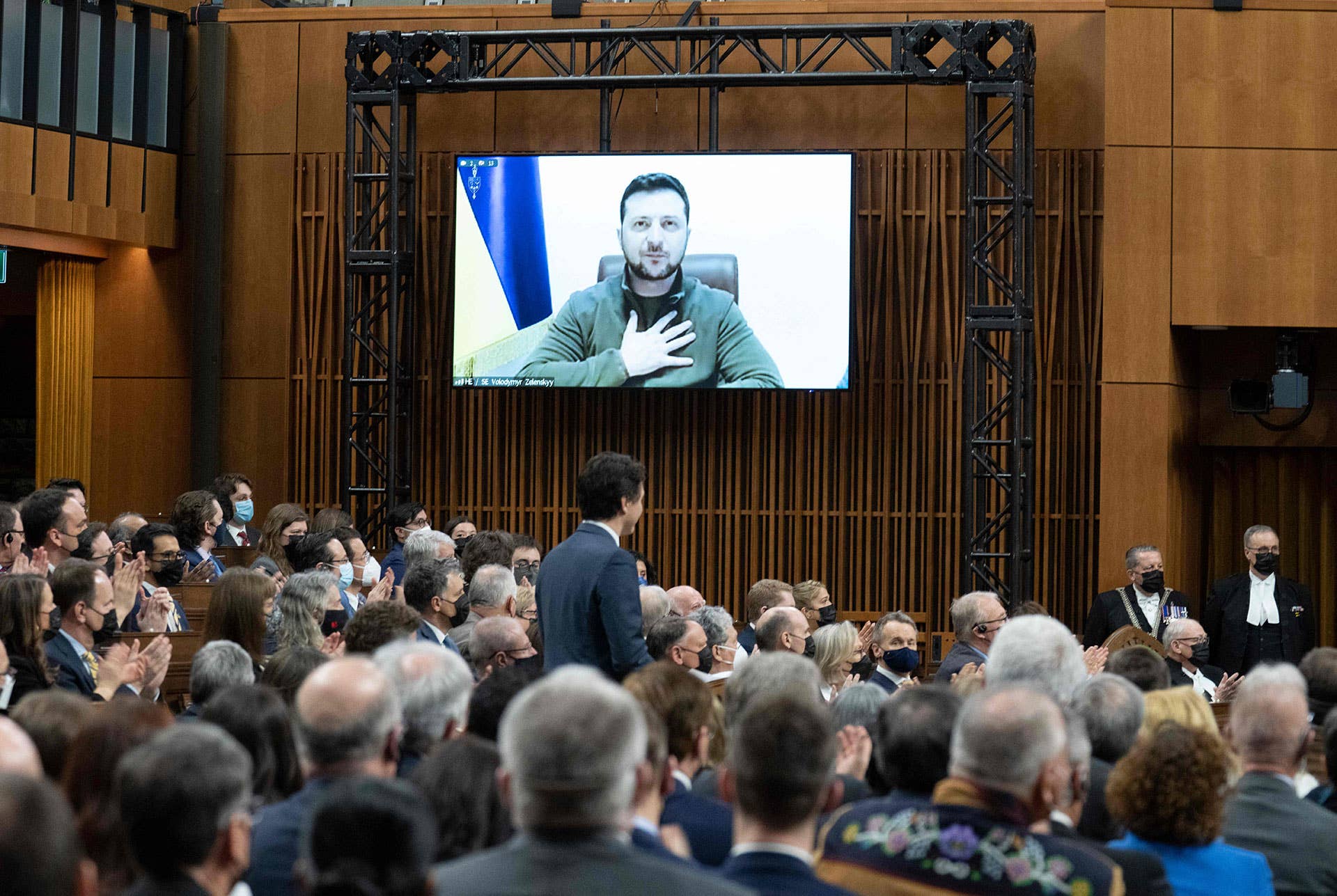 Ukrainian President Volodymyr Zelensky listens to Canadian Prime Minister Justin Trudeau