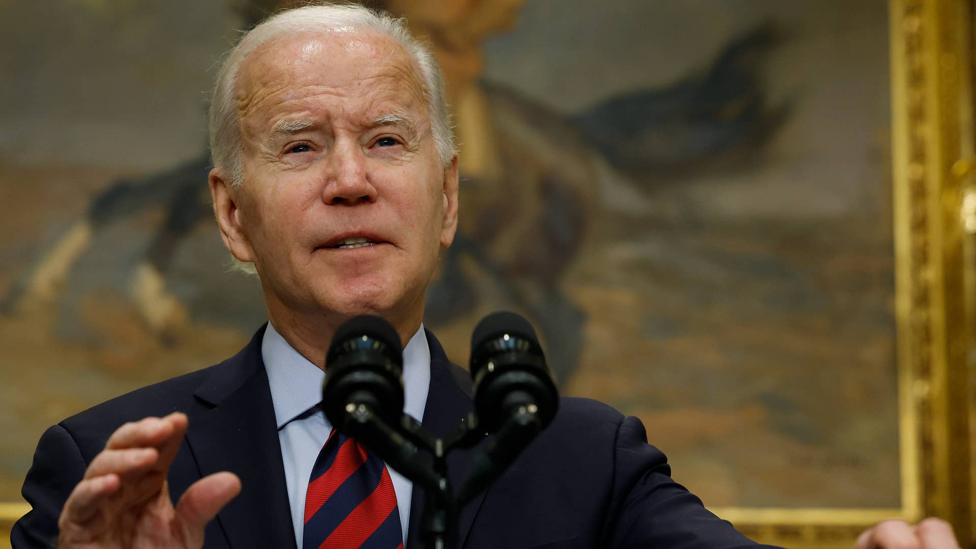 Biden is seen at the podium