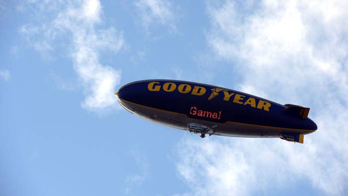 The Goodyear Blimp flies over the field before the 99th Rose Bowl Game.