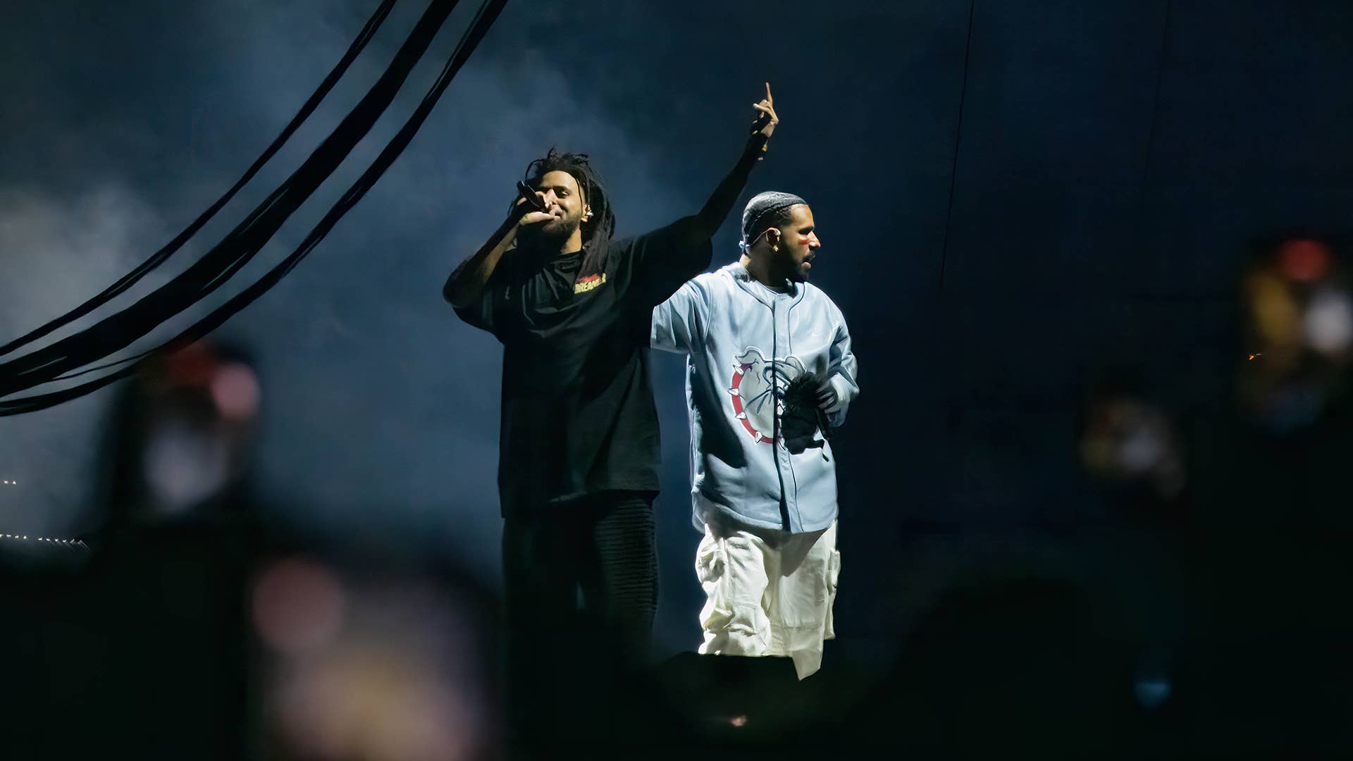 J. Cole (L) and Drake (R) perform during the Dreamville Festival at Dorothea Dix Park
