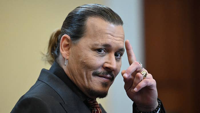 Johnny Depp looks on during a hearing at the Fairfax County Circuit Courthouse.