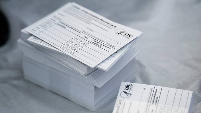 Photograph of stack of blank vaccine cards