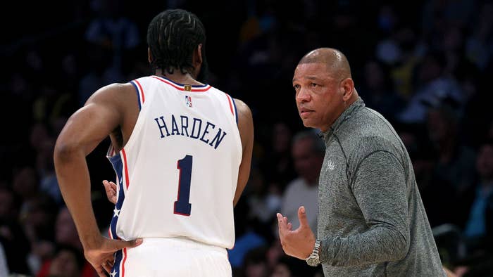 Head coach Doc Rivers of the Philadelphia 76ers speaks with James Harden